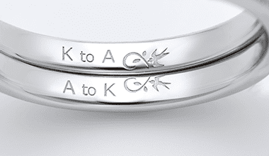 Wedding bands engraved inside with K to A and A to K and a bird motif