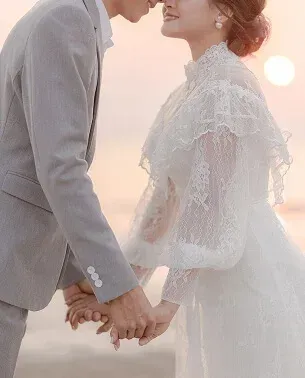 Bride and groom holding hands